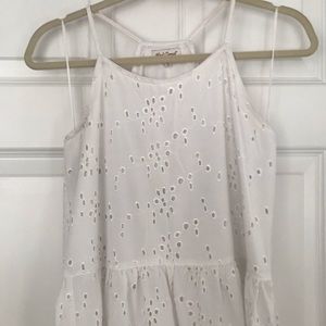 White flowing tank